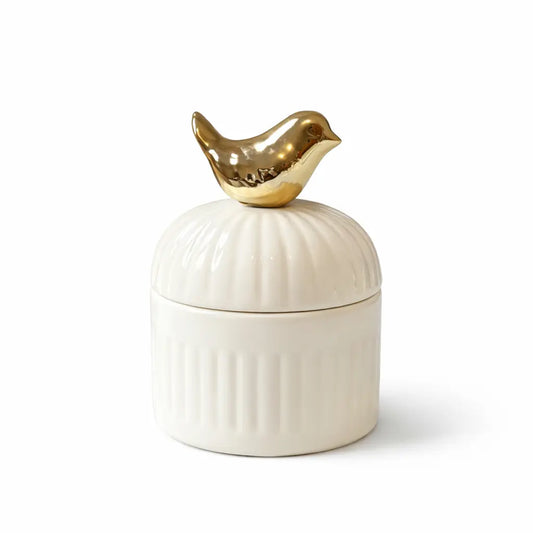 Lumânare parfumată din ceară de soia în vas ceramic ivoire cu capac decorativ și pasăre aurie